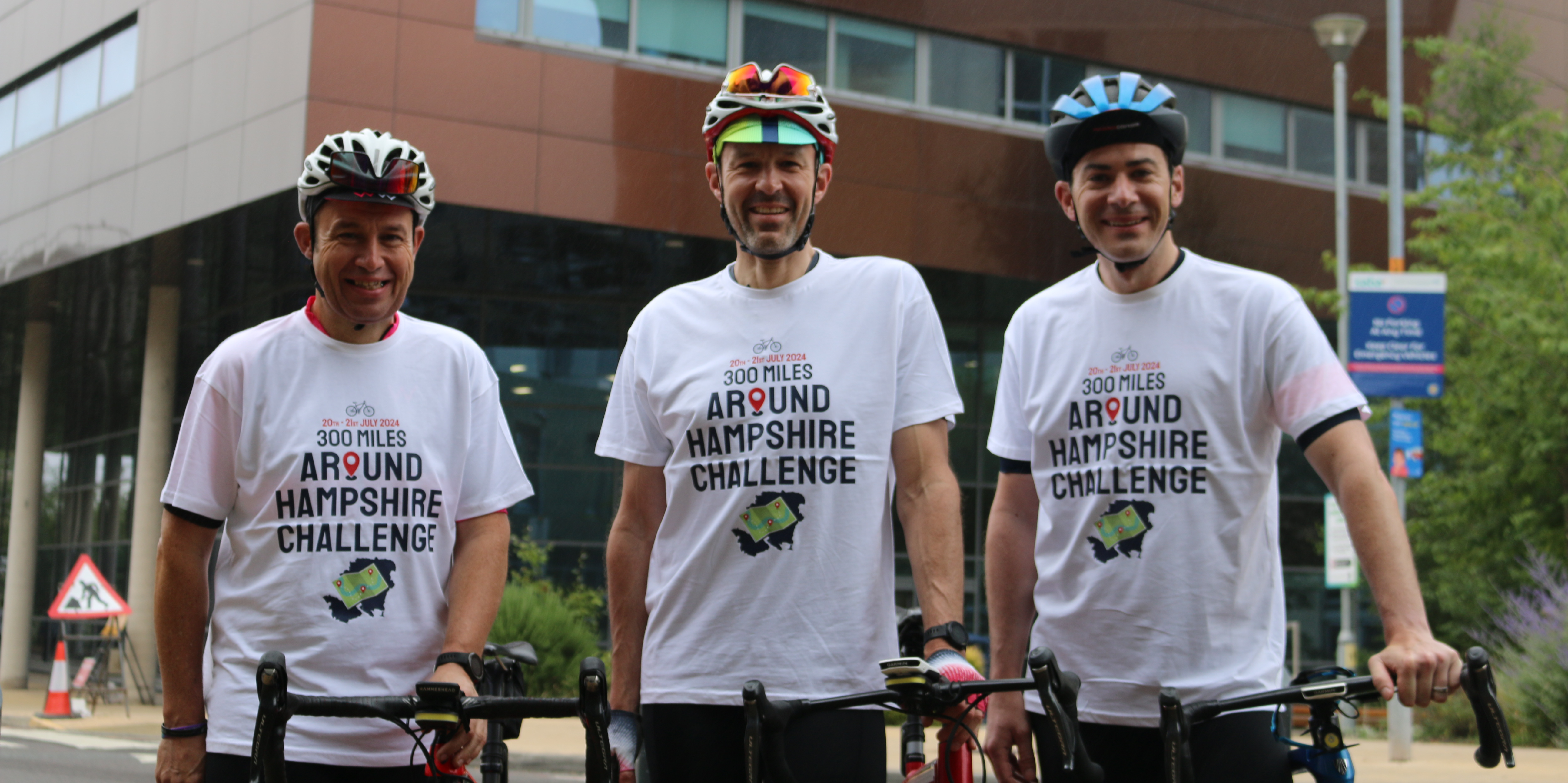 Tim (centre) and his two friends posing with their bikes infront of the CCI before setting off on a 300 mile cycle around hampshire. All wearing matching charity Tshirts